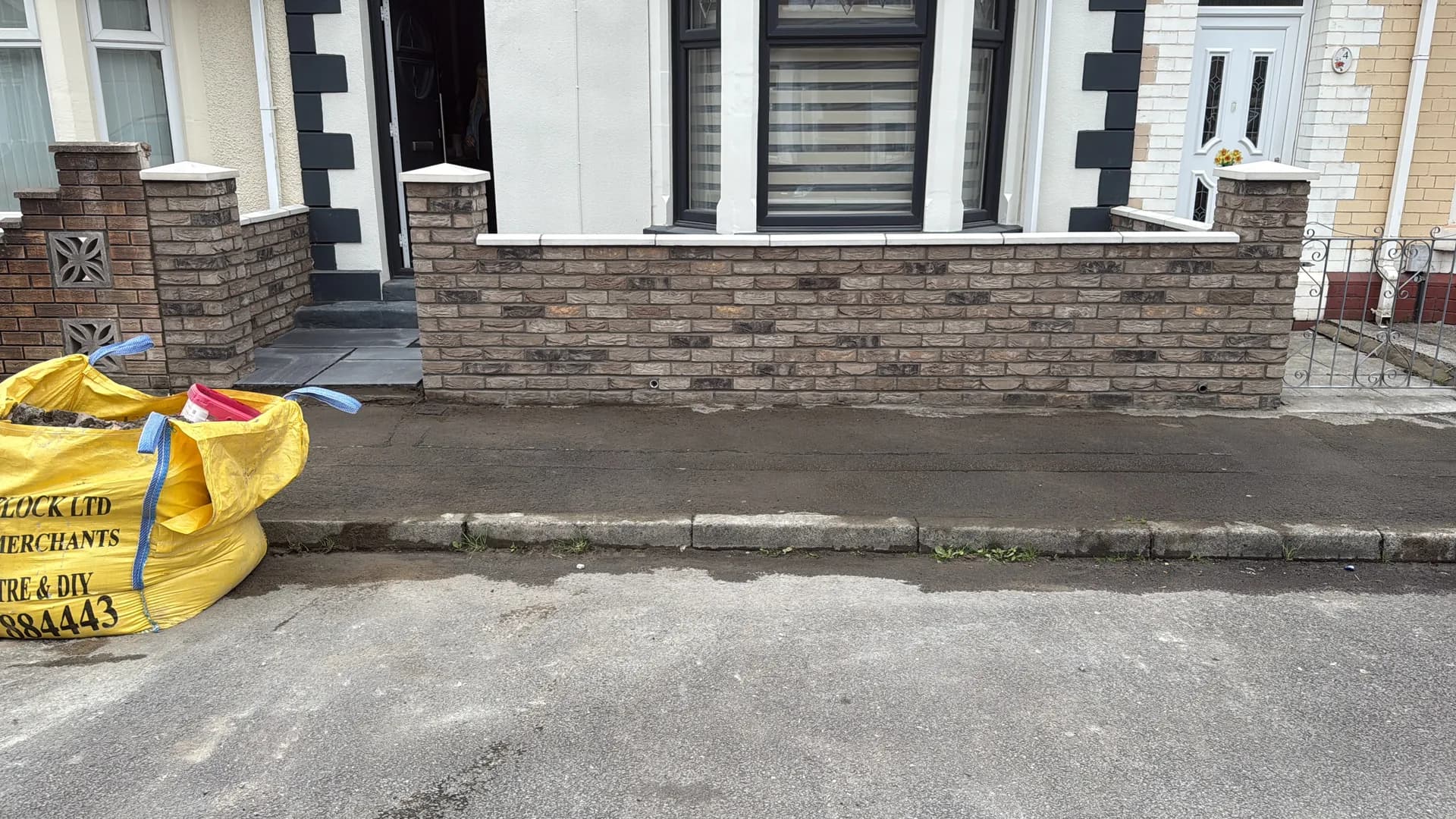 Front garden brick wall with piers and coping in Bridgend