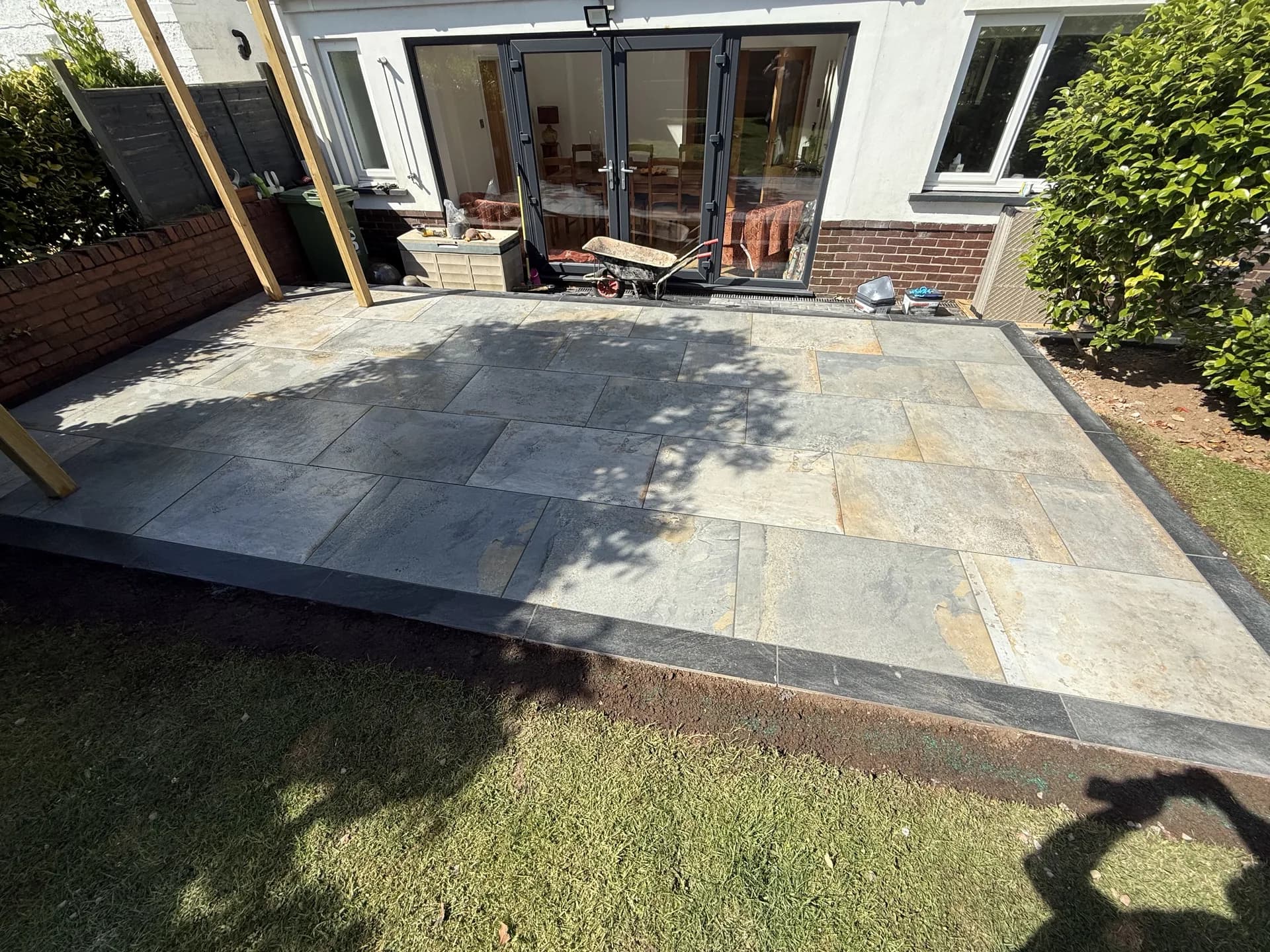 Indian stone patio with bifold doors in Pencoed